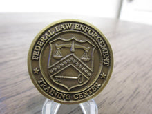 Load image into Gallery viewer, Federal Law Enforcement Training Center * Driver &amp; Marine Division FLETC Challenge Coin
