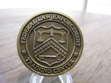 Load image into Gallery viewer, Federal Law Enforcement Training Center * Driver &amp; Marine Division FLETC Challenge Coin
