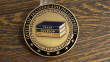 Load image into Gallery viewer, CBP Customs &amp; Border Protection Training &amp; Development Unit Challenge Coin #299W
