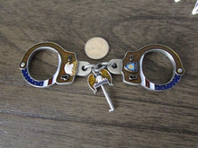 Load image into Gallery viewer, NYPD American Flag Handcuffs With Eagle Key Brown Wood Version Challenge Coin
