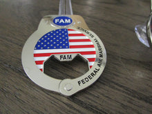 Load image into Gallery viewer, US Federal Air Marshal Service FAM FAMS Handcuff Bottle Opener Challenge Coin
