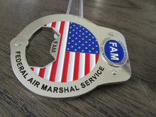 Load image into Gallery viewer, US Federal Air Marshal Service FAM FAMS Handcuff Bottle Opener Challenge Coin
